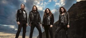 Read more about the article TÝR Debut New Video For “Hold the Heathen Hammer High”.